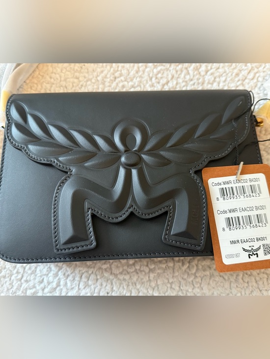 MCM Handbags - MCM
Himmel Maxi Logo Leather Crossbody Bag